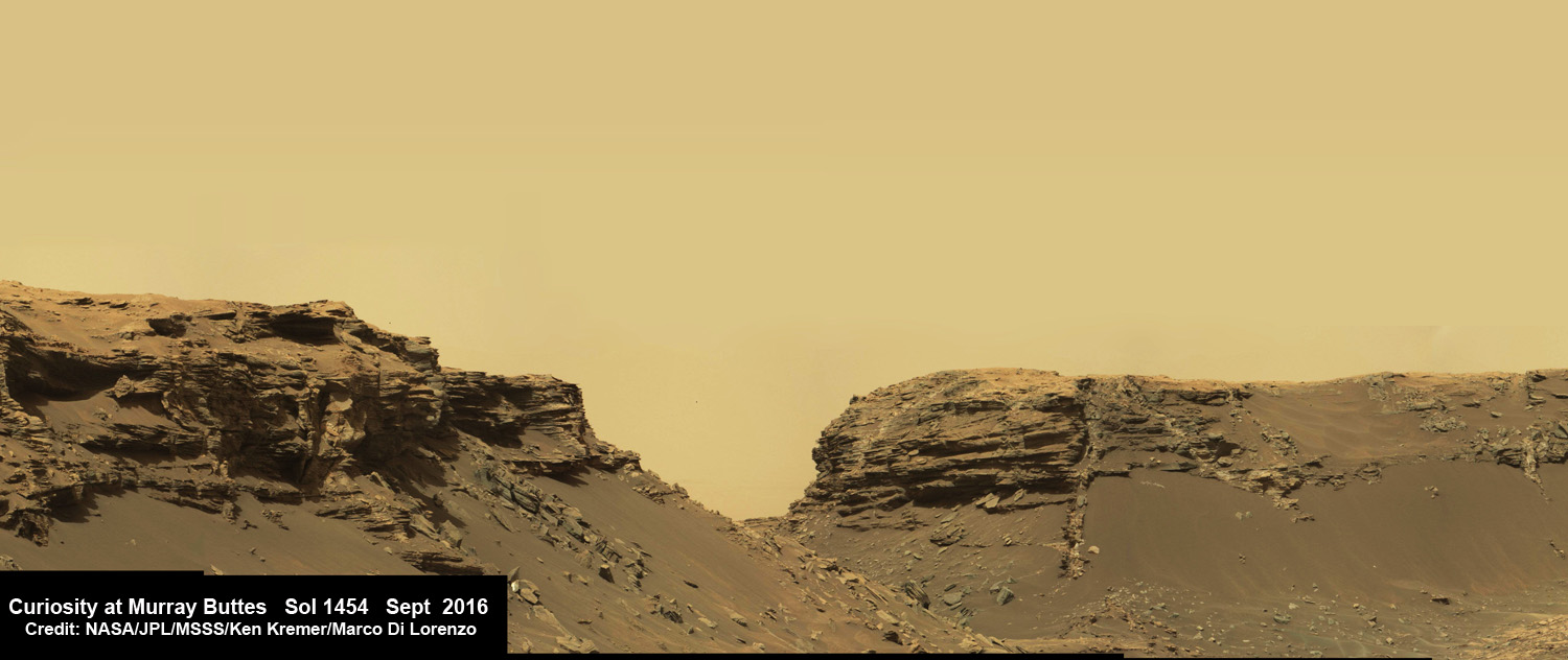 Dramatic hillside view showing sloping buttes and layered outcrops within of the Murray Buttes region on lower Mount Sharp from the Mast Camera (Mastcam) on NASA's Curiosity Mars rover. This photo mosaic is stitched and cropped from Mastcam camera raw images taken on Sol 1454, Sept. 8, 2016, with added artificial sky.  Credit: NASA/JPL/MSSS/Ken Kremer/kenkremer.com/Marco Di Lorenzo