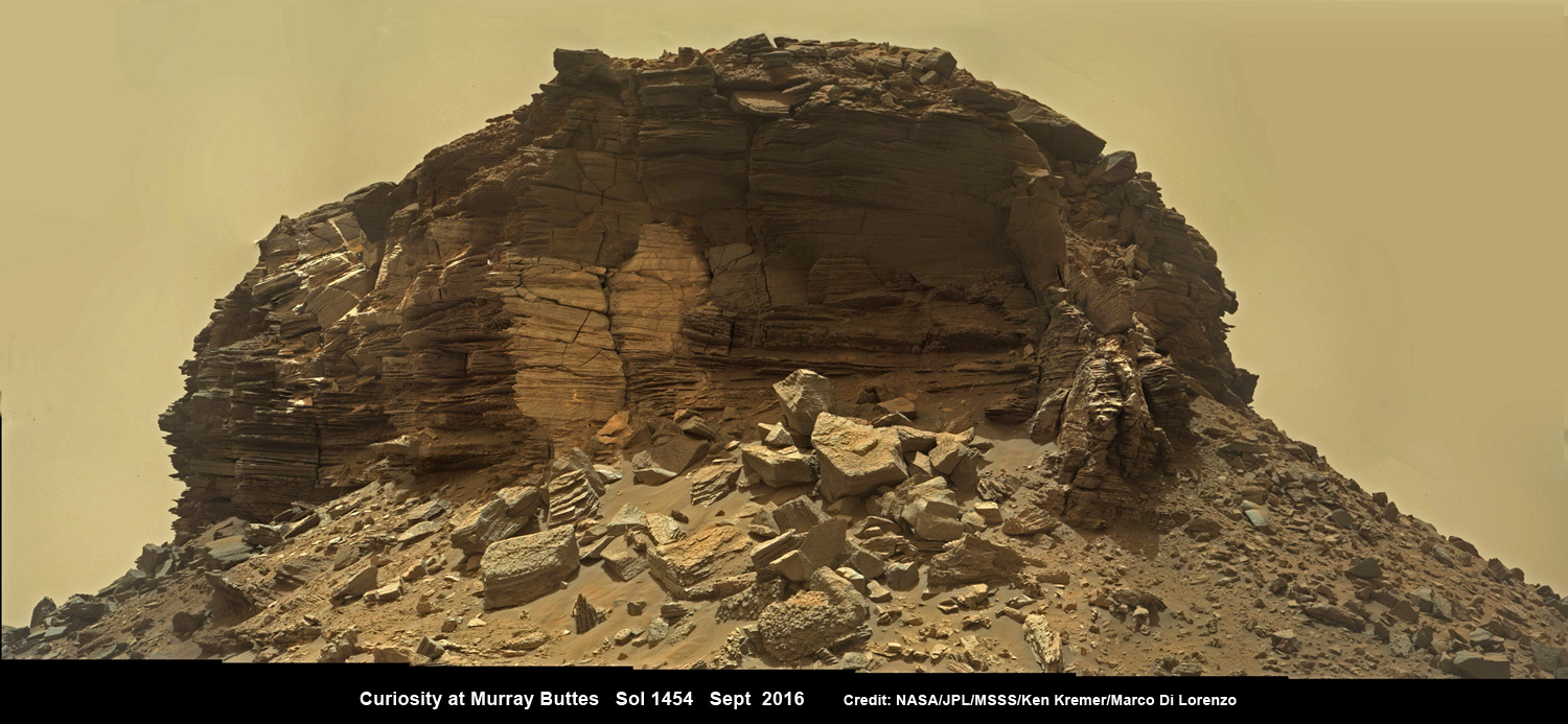 Dramatic closeup mosaic view of hilly outcrop with sandstone layers showing cross-bedding  in the Murray Buttes region on lower Mount Sharp from the Mast Camera (Mastcam) on NASA's Curiosity Mars rover. This photo mosaic is stitched from Mastcam camera raw images taken on Sol 1454, Sept. 8, 2016, with added artificial sky.  Credit: NASA/JPL/MSSS/Ken Kremer/kenkremer.com/Marco Di Lorenzo