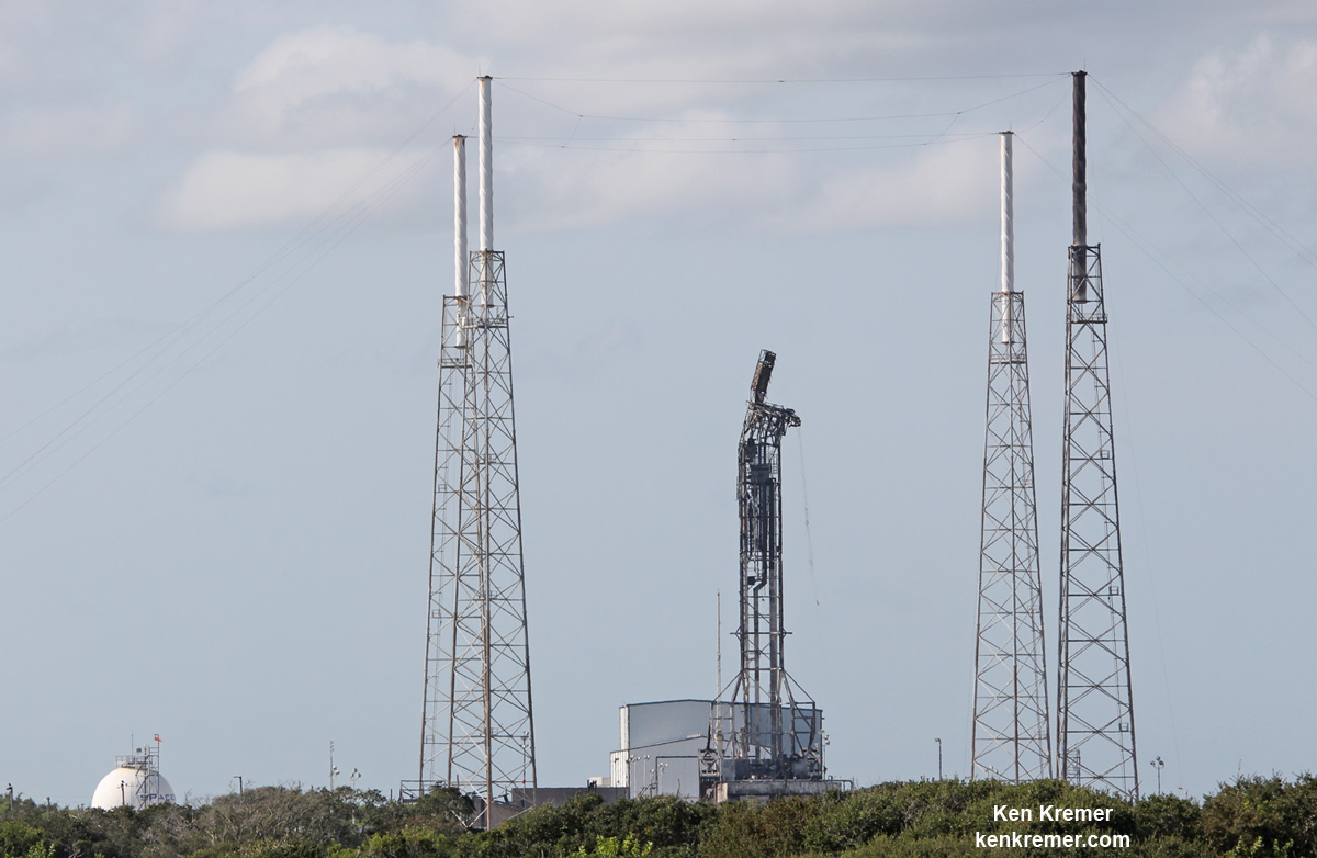 Mangled SpaceX Falcon 9 strongback with dangling cables (at right) as seen on Sept. 7 after prelaunch explosion destroyed the rocket and AMOS-6 payload at Space Launch Complex-40 at Cape Canaveral Air Force Station, FL on Sept. 1, 2016 . Credit: Ken Kremer/kenkremer.com