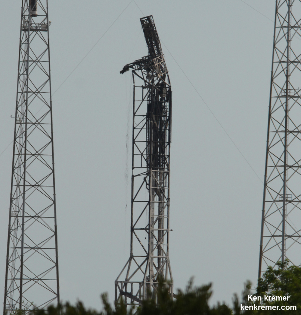 Mangled SpaceX Falcon 9 strongback with dangling cables as seen on Sept. 7 after prelaunch explosion destroyed the rocket and AMOS-6 payload at Space Launch Complex-40 at Cape Canaveral Air Force Station, FL on Sept. 1, 2016 . Credit: Ken Kremer/kenkremer.com