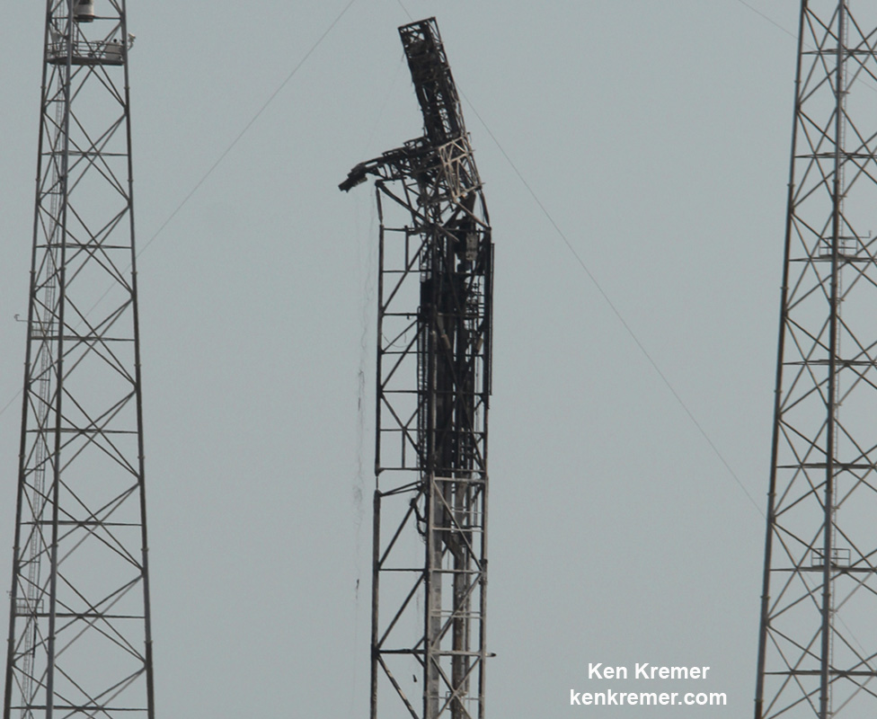 Up close view of mangled SpaceX Falcon 9 strongback with dangling cables as seen on Sept. 7 after prelaunch explosion destroyed the rocket and AMOS-6 payload at Space Launch Complex-40 at Cape Canaveral Air Force Station, FL on Sept. 1, 2016 . Credit: Ken Kremer/kenkremer.com