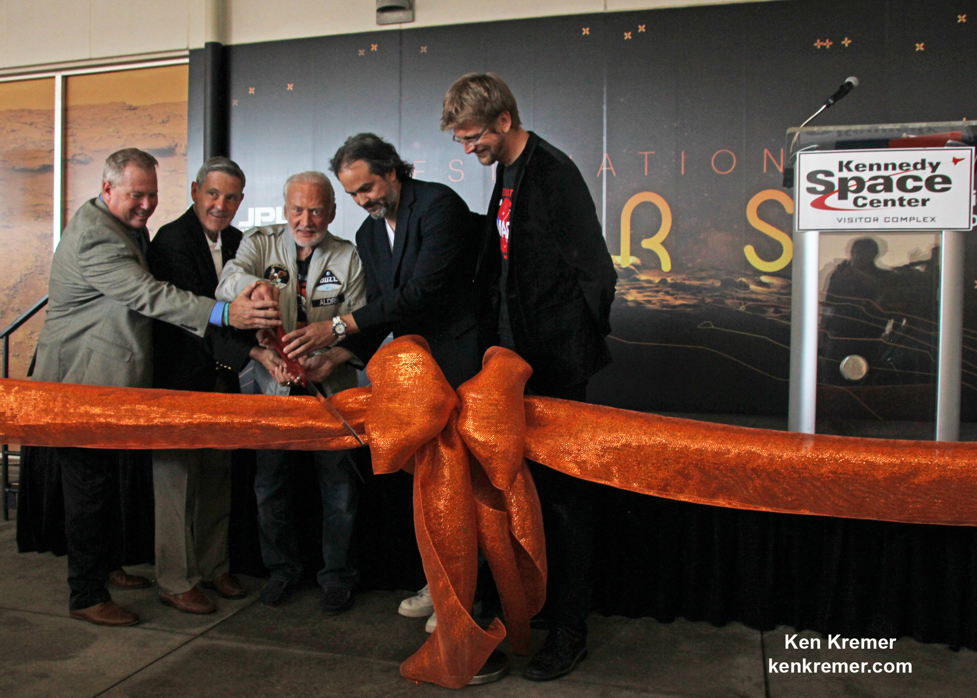 A ceremonial ribbon is cut for the opening of new "Destination: Mars" experience at the Kennedy Space Center visitor complex in Florida during media preview on Sept. 18, 2016. From the left are Therrin Protze, chief operating officer of the visitor complex; center director Bob Cabana; Apollo 11 astronaut Buzz Aldrin; Kudo Tsunoda of Microsoft; and Jeff Norris of NASA's Jet Propulsion Laboratory in Pasadena, California. Credit: Ken Kremer/kenkremer.com