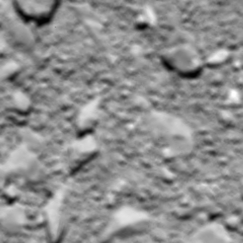 This is Rosetta's last image of Comet 67P/Churyumov-Gerasimenko, taken shortly before impact, an estimated 51 m above the surface. 