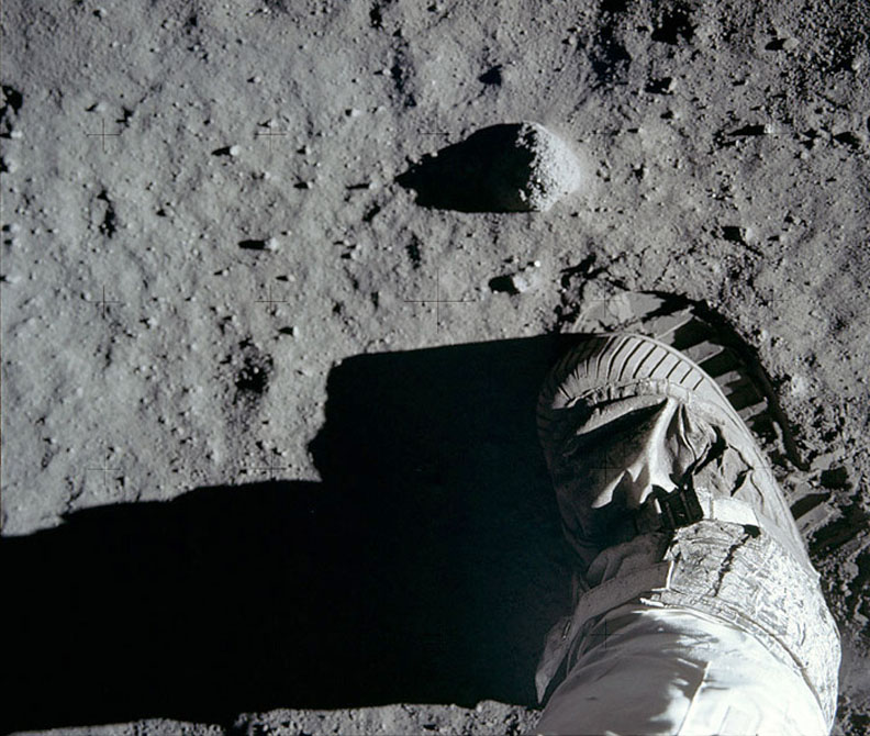 After taking the first boot print photo, Aldrin moved closer to the little rock and took this second shot. The dusty, sandy pebbly soil is also known as the lunar ‘regolith’. Click to enlarge. Credit: NASA