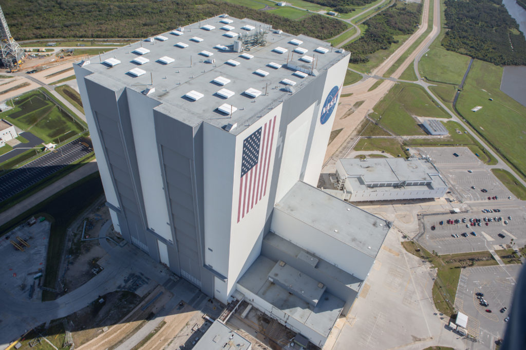 Aerial view of the Vehicle Assembly Building (VAB) at NASA’s Kennedy Space Center (KSC) on Oct. 8, 2016 by damage assessment and recovery team surveying the damage at KSC the day after Hurricane Matthew passed by Cape Canaveral on Oct. 7, 2016 packing sustained winds of 90 mph with gusts to 107 mph.  Credit: NASA/Cory Huston