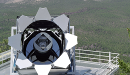 The Sloan Digital Sky Survey telescope stands out against the breaktaking backdrop of the Sacramento Mountains. 234 stars out of the Sloan's catalogue of over 2.5 million stars are producing an unexplained pulsed signal. Image: SDSS, Fermilab Visual Media Services