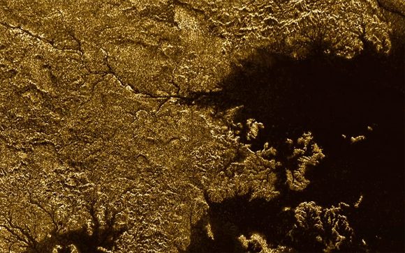 Saturn's largest moon, Titan, has features that resemble Earth's geology, with deep, steep-sided canyons. Credit: NASA/JPL/Cassini