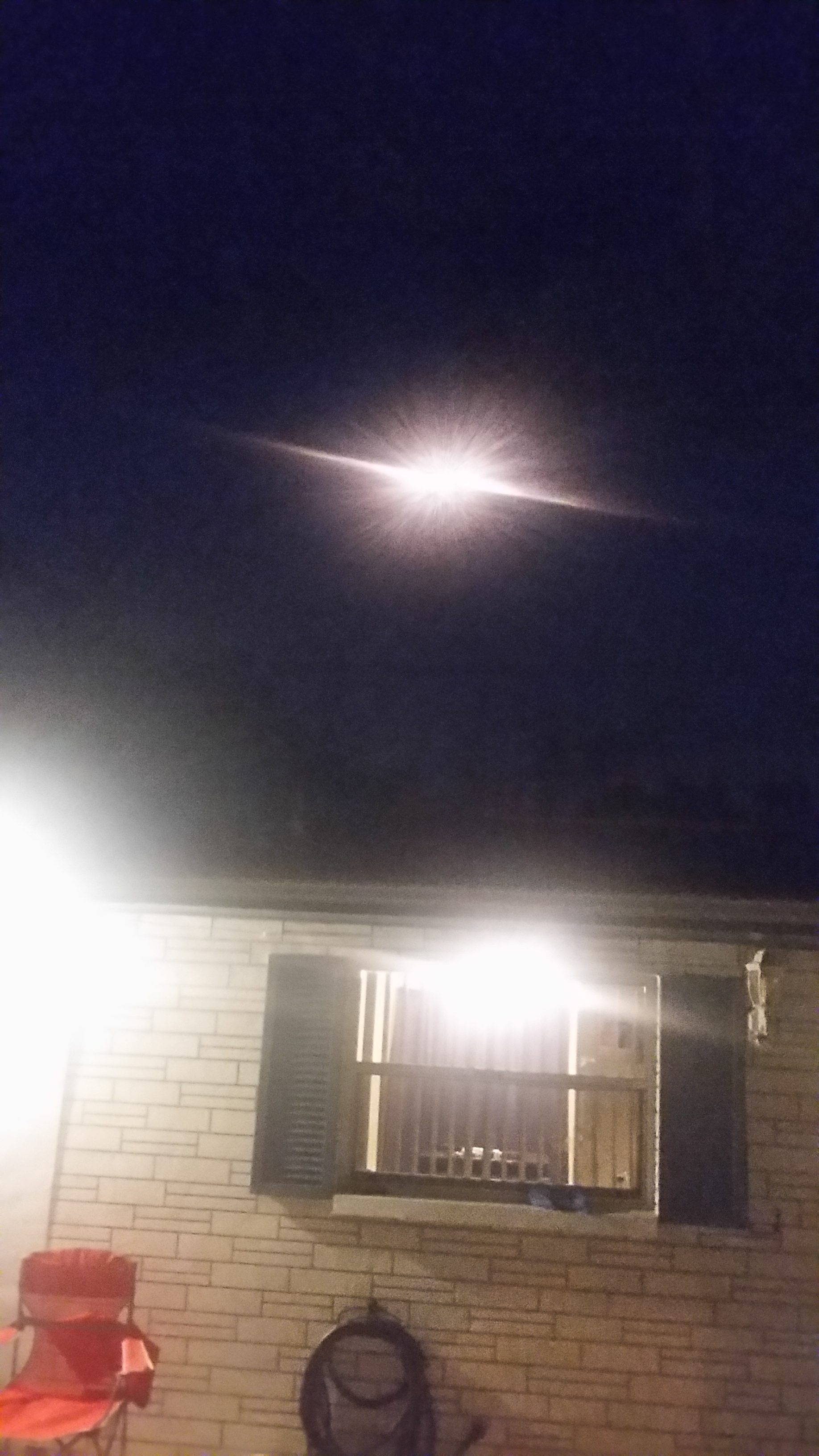 Atlas V/GOES-R launch as seen rising over neighbor houses in Titusville, Florida  on Nov. 19, 2016. Credit: Melissa Bayles