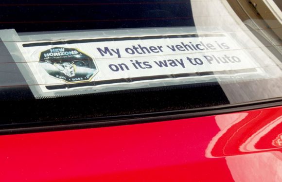 Bumper sticker on Alan Stern's car. Credit: Lowell Observatory. 