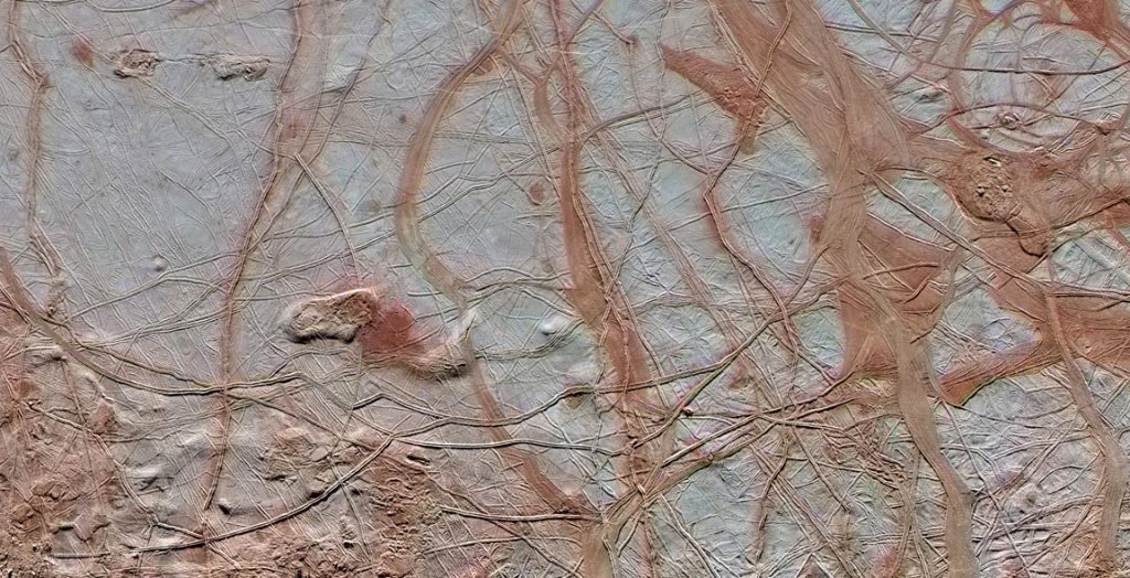 Images from NASA's Galileo spacecraft show the intricate detail of Europa's icy surface. The ridges, lumps and fractures are evidence of complexity under the icy surface. Image: NASA/JPL-Caltech