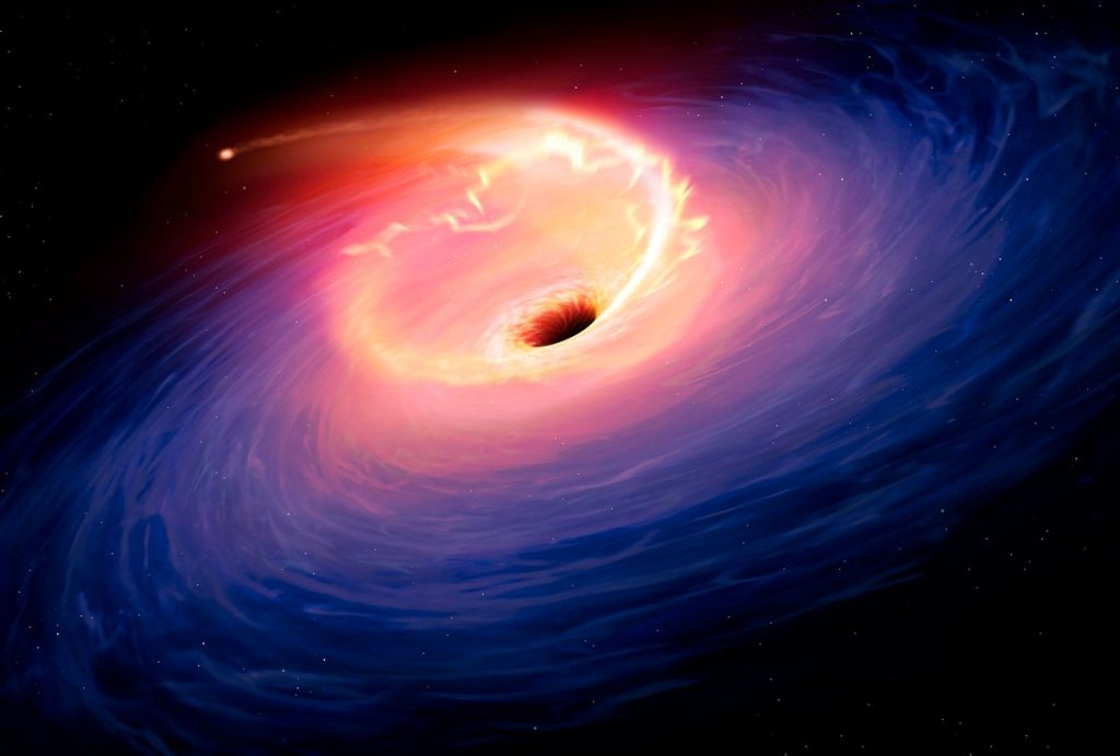 Depiction of the tidal disruption event in galaxy F01004-2237, similar to what might be happening in AT2019dsg. The release of gravitational energy as the debris of the star is accreted by the black hole leads to a flare in the optical light of the galaxy.