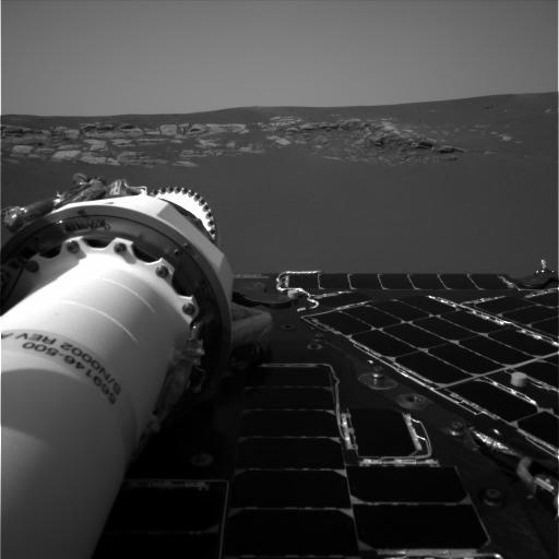 Opportunity's navigation camera took this picture, one of the rover's first, of the inside of Eagle Crater. Exposed Martian rocks are visible. NASA/JPL