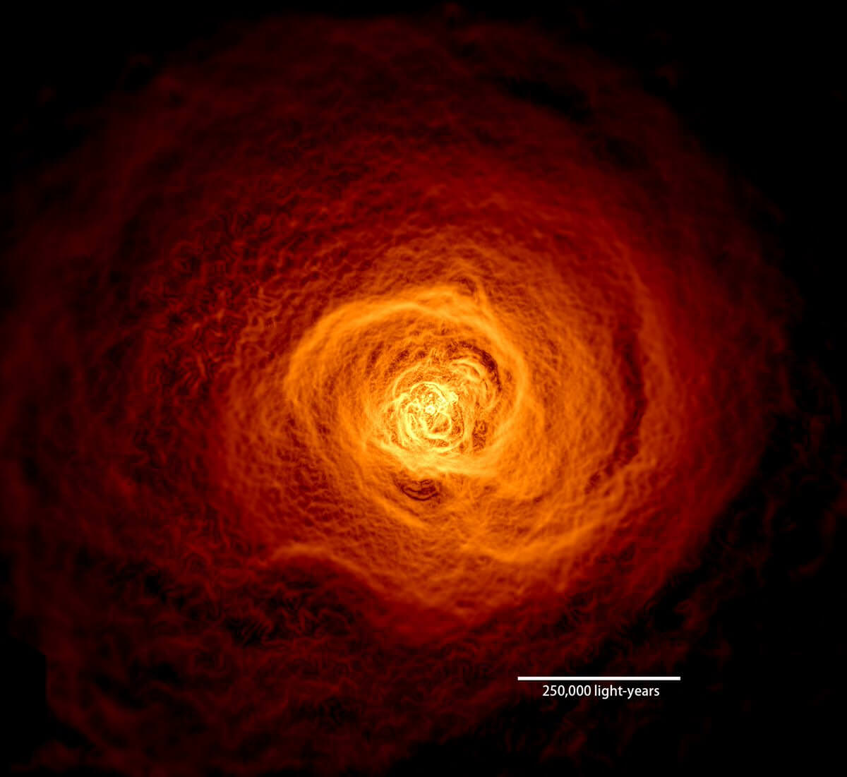 NASA has discovered a wave of hot gas larger than the Milky Way rolling through the Perseus galaxy cluster. This X-ray image is the result of 16 days of observing with the Chandra X-ray Observatory. The image was filtered to make details easier to see.Credit: NASA's Goddard Space Flight Center/Stephen Walker et al.