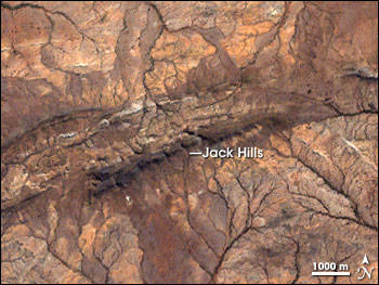 The detrital zircons formed elsewhere, but were deposited in the Jack Hills formation. By Robert Simmon, NASA - http://earthobservatory.nasa.gov/Study/Zircon/, Public Domain, https://commons.wikimedia.org/w/index.php?curid=4258701