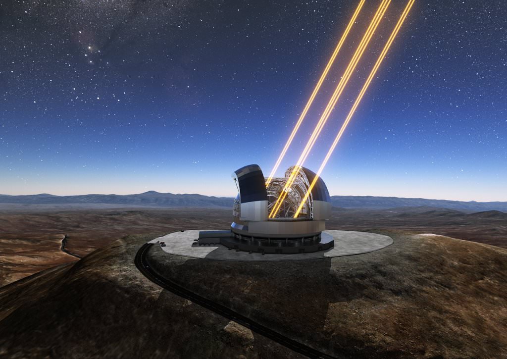 This artist’s rendering shows the Extremely Large Telescope in operation on Cerro Armazones in northern Chile. The telescope is shown using lasers to create artificial stars high in the atmosphere. Image: ESO/E-ELT