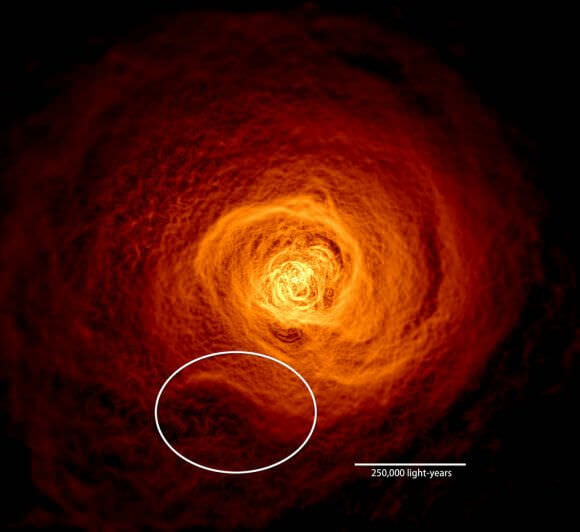 NASA has discovered a wave of hot gas larger than the Milky Way  rolling through the Perseus galaxy cluster. This X-ray image is the result of 16 days of observing with the Chandra X-ray Observatory. The image was filtered to make details easier to see. Credits: NASA's Goddard Space Flight Center/Stephen Walker et al.