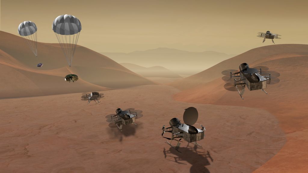 In this illustration, the Dragonfly helicopter drone is descending to the surface of Titan. Image: NASA