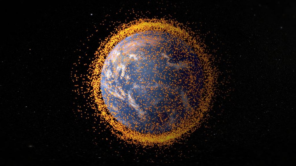 When humanity faces a problem, we usually waste time posturing and arguing before getting down to actual solutions. Think space junk and climate change. This illustration shows the cloud of space debris that currently surrounds the Earth, a problem still waiting for a coordinated solution. Credit: NASA's Goddard Space Flight Center/JSC