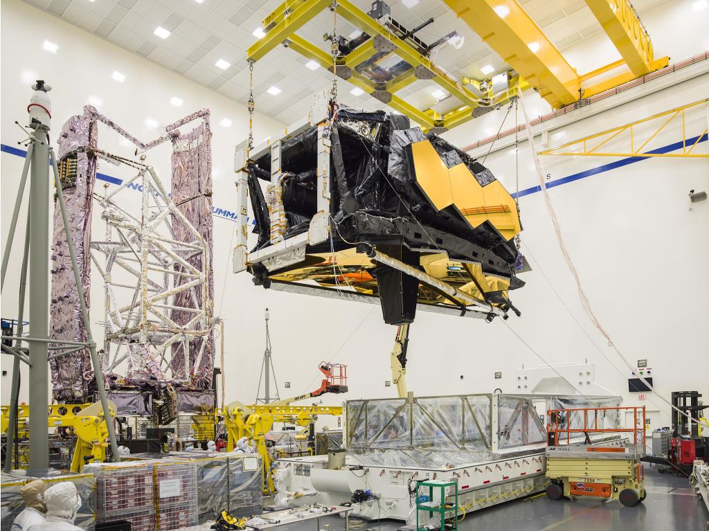 The combined optics and science instruments of NASA’s James Webb Space Telescope being removed from the Space Telescope Transporter for Air, Road and Sea (STTARS) at the Northrop Grumman company headquarters on March 8th, 2018. Credits: NASA/Chris Gunn