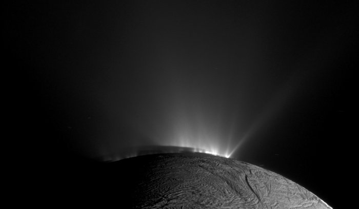 Cryvolcanism at Enceladus, a moon of Satury. This Cassini narrow-angle camera image looks across the south pole of Enceladus and its geysers of material. Credit: NASA/JPL-Caltech/Space Science Institute/. Pluto is known to have cryovolcanoes, too.