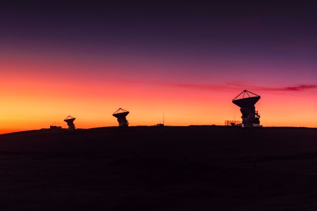 Three of the dishes that make up the Atacama Large Millimeter/submillimter Array (ALMA). Image Credit: H. Calderón – ALMA (ESO/NRAO/NAOJ)