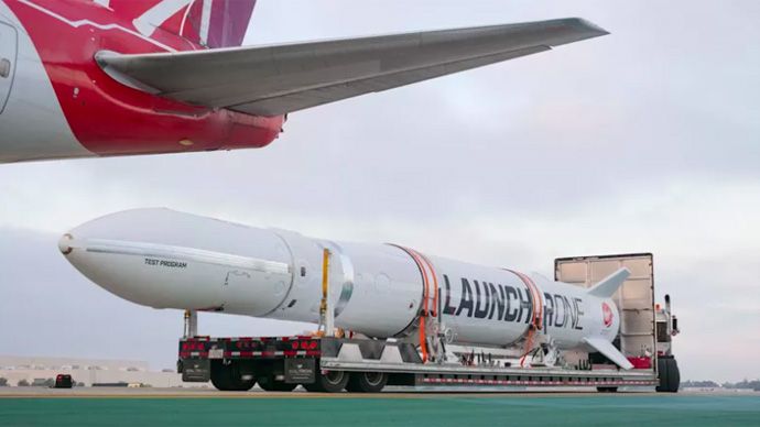 Launcher One being maneuvered into position under Cosmic Girl. Image: Virgin Orbit
