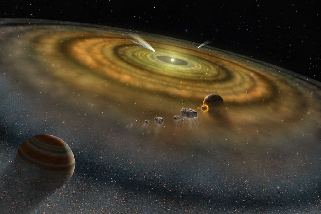 An artist’s conception of the dust and gas surrounding a newly formed planetary system. Somewhere in there is Earth's water. Credit: NASA