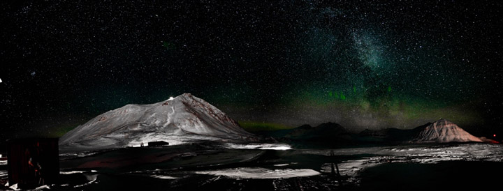 Aurora and stars over Ny-Ålesund. Image Credit: Chris Pirner