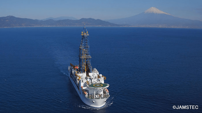The Japanese scientific drilling vessel Chikyu has made it possible for scientists to access microbial life in the deep subsurface. The ship is designed to ultimately drill 7 km beneath the seabed in some of the planet’s most seismically-active regions. DCO researchers were onboard the vessel for an expedition to the Nankai Trough in 2016 to determine the temperature and pressure limits of microbial life at temps above 120°C. Photo copyright JAMSTEC. 
