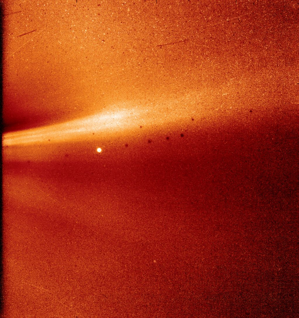 The Parker Solar Probe's WISPR (Wide-field Imager for Solar Probe) instrument captured this image of a coronal streamer on Nov. 8th, 2018. Coronal streamers are structures of solar material within the Sun's atmosphere, the corona, that usually overlie regions of increased solar activity. The fine structure of the streamer is very clear, with at least two rays visible. The bright object near the center of the image is Mercury, and the dark spots are a result of background correction. Credits: NASA/Naval Research Laboratory/Parker Solar Probe