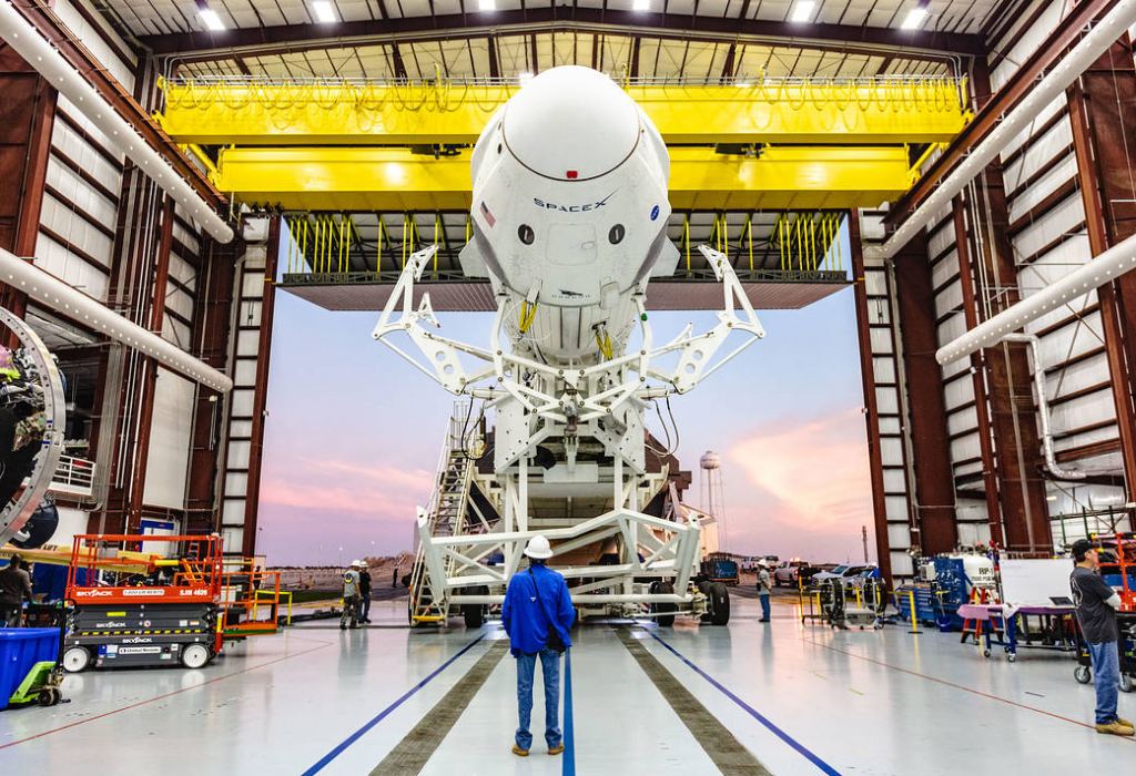 A SpaceX Falcon 9 rocket with the company’s Crew Dragon attached, rolls out of the company’s hangar at NASA Kennedy Space Center’s Launch Complex 39A on Jan. 3, 2019. The rocket will undergo checkouts prior to the liftoff of Demo-1, the inaugural flight of one of the spacecraft designed to take NASA astronauts to and from the International Space Station. NASA has worked with SpaceX and Boeing in developing Commercial Crew Program spacecraft to facilitate new human spaceflight systems launching from U.S. soil with the goal of safe, reliable and cost-effective access to low-Earth orbit destinations such as the space station. Image Credit: SpaceX
