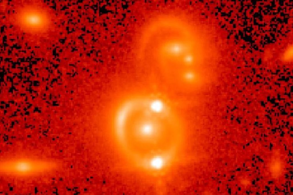 A Hubble Space Telescope image of a doubly-imaged quasar. Image Credit: NASA Hubble Space Telescope, Tommaso Treu/UCLA, and Birrer et al