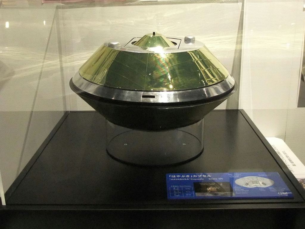A replica of Hayabusa's SRC. Hayabusa was the precursor to the Hayabusa2 mission, and Hayabusa2's SRC is almost exactly the same. Image Credit: By Mj-bird - Own work, CC BY-SA 3.0, https://commons.wikimedia.org/w/index.php?curid=12223203