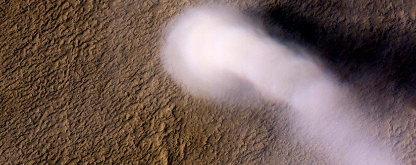 A very large Martian dust devil. This one reached 20 km high. Image Credit: NASA/JPL/University of Arizona