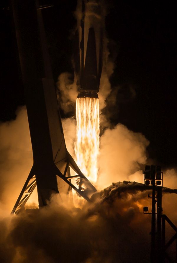 A close-up of the Falcon 9 engines shortly after lift-off. Image Credit: Alex Brock.