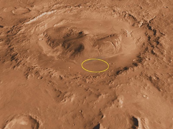 An oblique image of Mt. Sharp inside Gale Crater on Mars. The yellow ellipse is Curiosity's landing spot. Image Credit: NASA/JPL