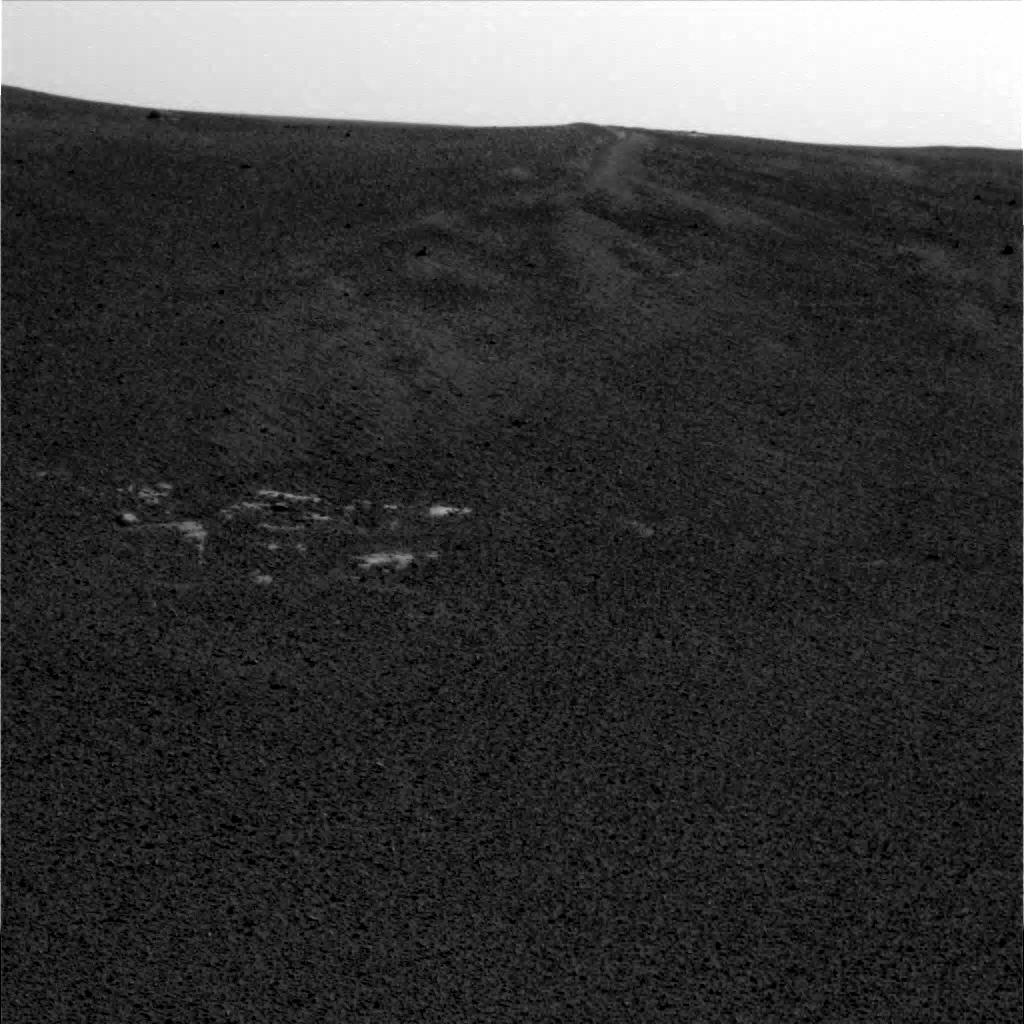 Opportunity's first image from Mars on Sol 1 at 15:30:50 Mars time. Captured with the Left Panoramic Camera. Image Credit: NASA/JPL/Cornell  