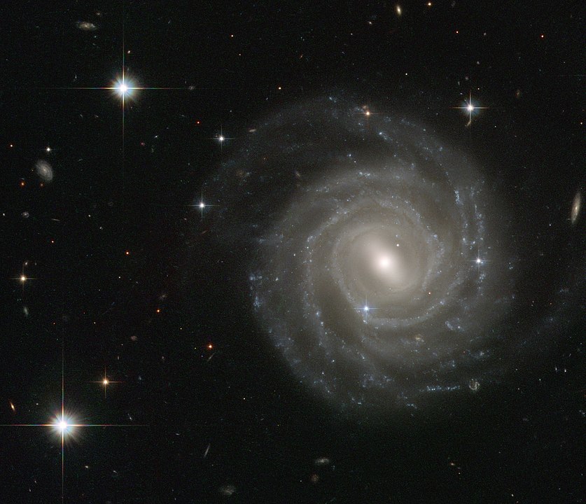 A Hubble image of the barred spiral galaxy UGC 12158, which astronomers think looks a lot like the Milky Way. UGC 12158 is about 400 million light years away, and gives us a stunning, picture perfect view of a barred spiral galaxy. Image Credit: By ESA/Hubble & NASA - http://www.spacetelescope.org/images/potw1035a/, Public Domain, https://commons.wikimedia.org/w/index.php?curid=12385417