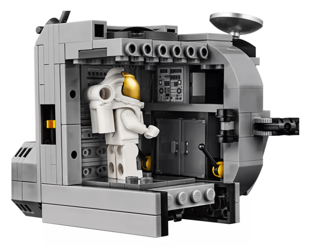 Neil, or is it Buzz, hard at work inside the Eagle. Image Credit: LEGO