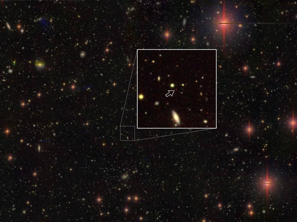 In this Subaru Telescope image, SMBH is 13.05 billion light years from Earth. These ancient SMBHs have challenged our understanding of how to make black holes. Image credit: Japan's National Astronomical Observatory (NAOJ).