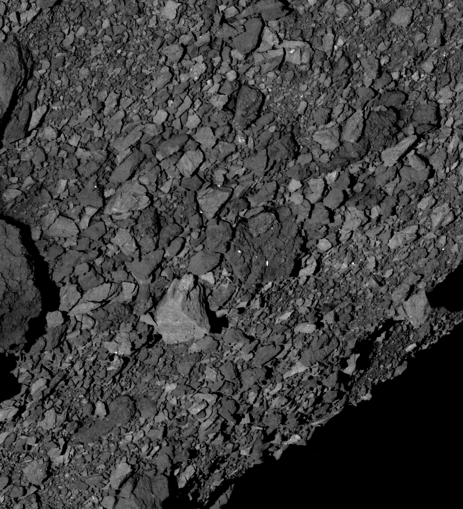  This image shows a view across asteroid Bennu’s southern hemisphere and into space, and it demonstrates the number and distribution of boulders across Bennu’s surface. The image was obtained on Mar. 7 by the PolyCam camera on NASA’s OSIRIS-REx spacecraft from a distance of about 3 miles (5 km). The large, light-colored boulder just below the center of the image is about 24 feet (7.4 meters) wide, which is roughly half the width of a basketball court. Image Credit:  NASA/Goddard/University of Arizona 