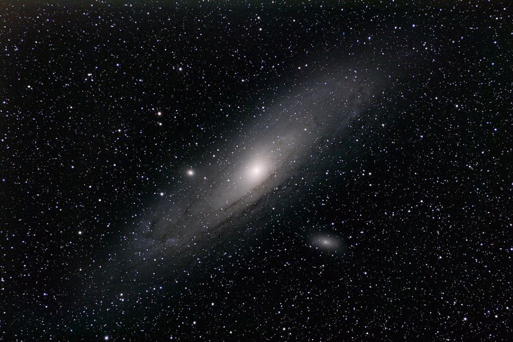 The Andromeda galaxy with M 110 below and to the right. Image Credit: By Torben Hansen - https://www.flickr.com/photos/torbenh/6105409913, CC BY 2.0, https://commons.wikimedia.org/w/index.php?curid=54367045