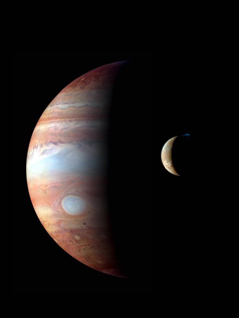 This is image is from the New Horizons spacecraft. It shows Io orbiting Jupiter, with one of Io's many volcanoes erupting. It was captured in 2007 when New Horizons was on its way to Pluto. Image Credit:  NASA/Johns Hopkins University Applied Physics Laboratory/Southwest Research Institute/Goddard Space Flight Center 