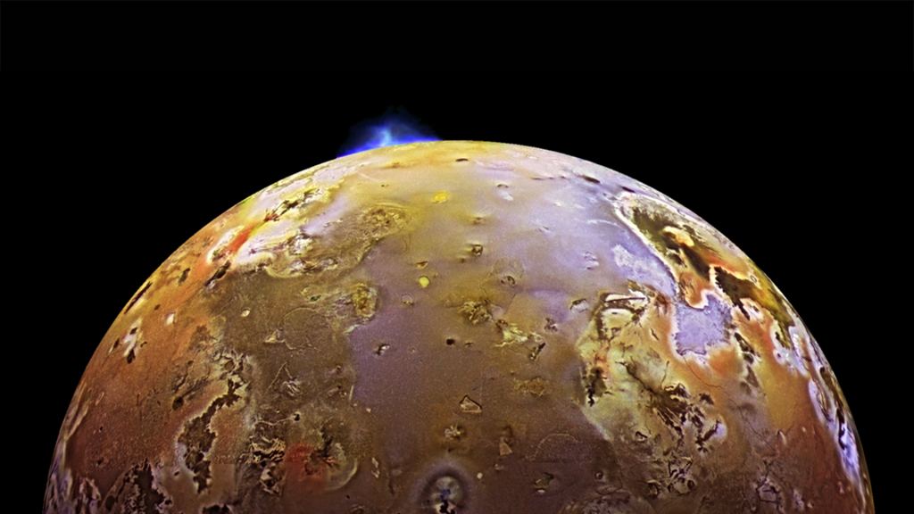 One of many volcanic eruptions that happen regularly on Io, the most volcanically active body in the Solar System. Io is heated by tidal interactions with Jupiter, which squeeze the moon and heat it up. Image Credit:  NASA/JPL/University of Arizona 