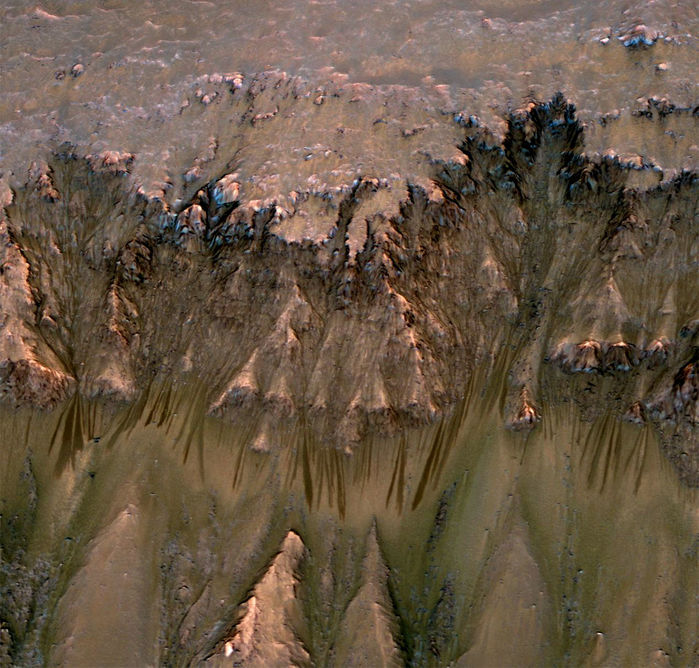 These dark streaks, called recurring slope linae (RSL) look like seasonal water seepages, a great place for Curiosity to explore habitability on Mars. But the Office of Planetary Protection thought otherwise. Image Credit:  NASA/JPL-CALTECH/UNIV. OF ARIZONA 