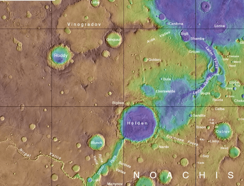 Scientists think that during an ancient flood, water from Nirgal Vallis (bottom left) flowed in Uzbol Vallis and was stopped by the rim of Holden Crater. Eventually, the rim burst open and Holden Crater was turned into a lake. Image Credit: By Jim Secosky modified NASA image. NASA/USGS - https://planetarynames.wr.usgs.gov/images/mc19_2014.pdf, Public Domain, https://commons.wikimedia.org/w/index.php?curid=61338154