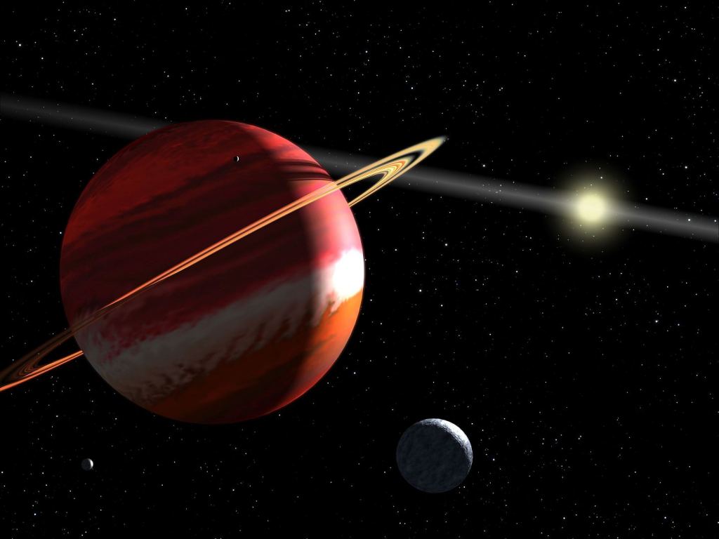 An artist's illustration of Epsilon Eridani and two exoplanets. EE is a K-dwarf star that's only 10.5 light years from the Sun. It may host exoplanets, but their existence is controversial. Epsilon Eridani is young, only a billion years old, and it's undergoing a tumultuous youth at this age. But it'll calm down eventually, and could be a stable, hospitable star for tens of billions of years. Image Credit: By NASA, ESA, G. Bacon - http://www.spacetelescope.org/images/heic0613a/, Public Domain, https://commons.wikimedia.org/w/index.php?curid=4208005