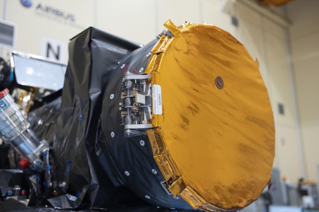 The telescope baffle cover of the Cheops satellite, pictured here during spacecraft testings in the clean room at Airbus Defence and Space Spain, Madrid, protected the mission's science instrument from dust and bright light during testing, launch and the early phases of in-orbit commissioning. The cover was opened successfully on January 29th. Image Credit: ESA–S. Corvaja 