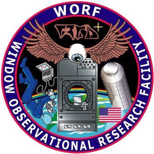 The patch logo for WORF, the Window Observational Research Facility on the ISS. Notice the Klingon writing under "WORF" at the top. Image Credit: NASA