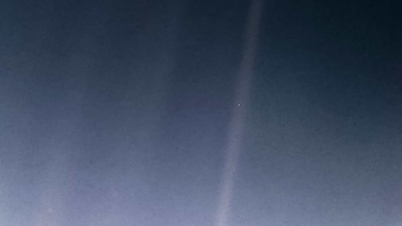 This updated version of the iconic "Pale Blue Dot" image taken by the Voyager 1 spacecraft uses modern image-processing software and techniques to revisit the well-known Voyager view while attempting to respect the original data and intent of those who planned the images. Credit: NASA/JPL-Caltech